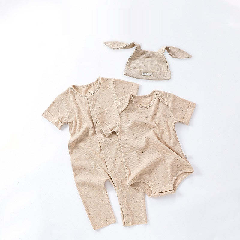 Summer Baby Boys and Girls Solid Color Crew Neck T-shirts in beige and apricot with short sleeves and dot pattern.