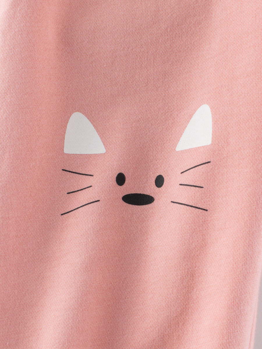 A cute summer outfit for baby girls featuring a breathable cotton fabric with a playful catty face pattern in pink.