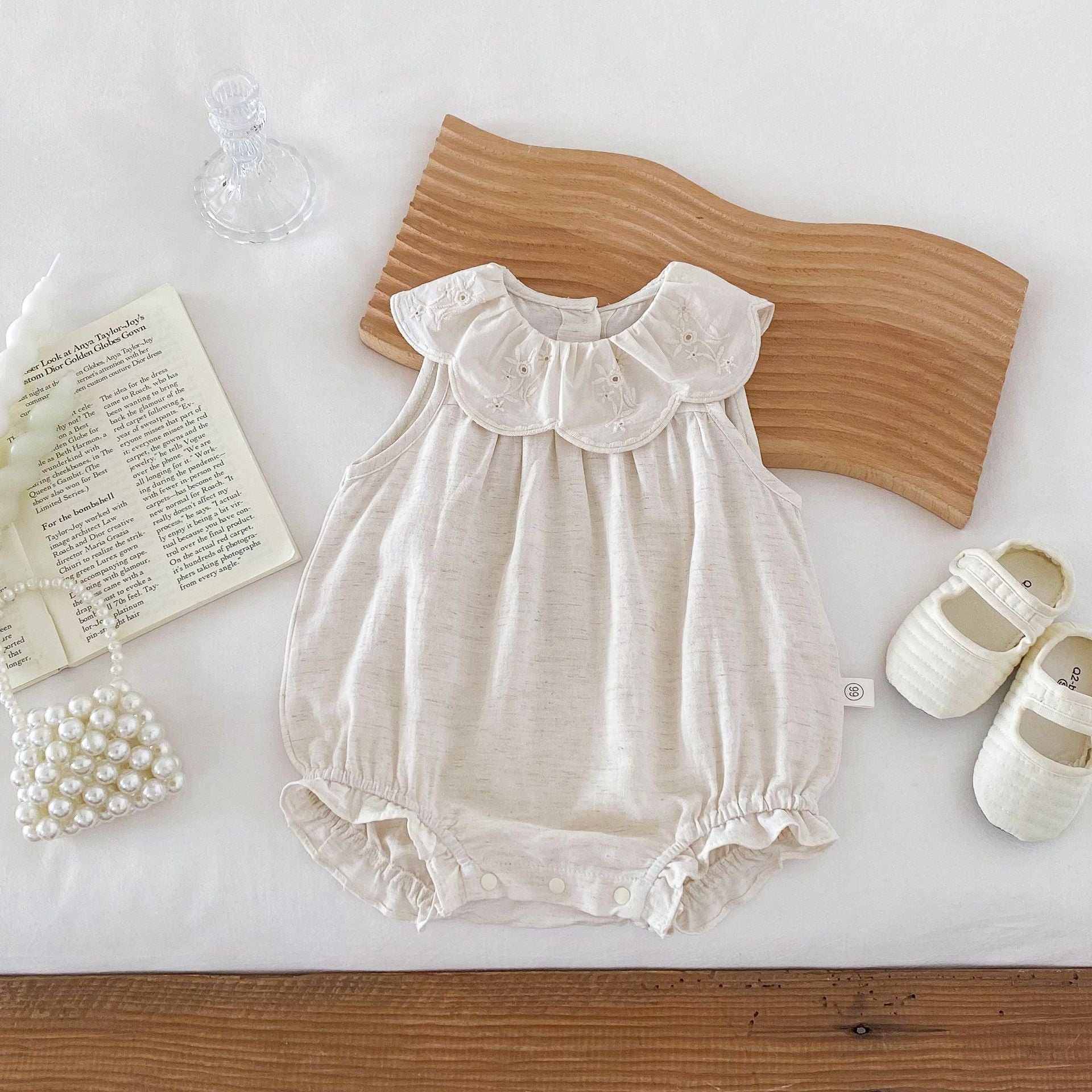Summer Baby Girls Solid Color Simple Floral Embroidery Sleeveless dress in white, featuring delicate floral embroidery and a sleeveless design.