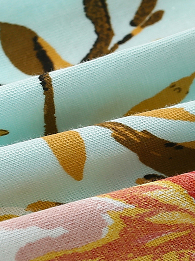 Summer Baby Kids Girls Floral Print T-Shirt and Shorts set in green, featuring a vibrant floral design, perfect for warm weather.