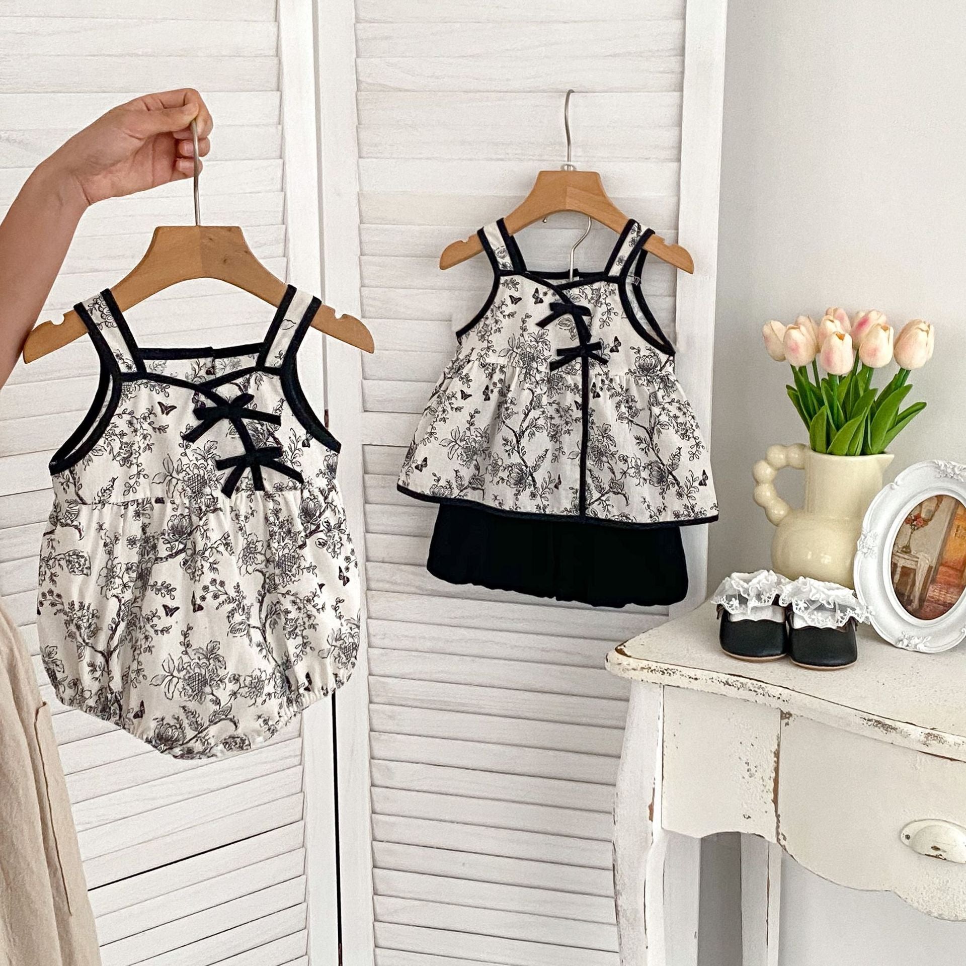 Summer Baby Kids Girls Flowers Pattern Sleeveless Strap Onesies in white, featuring a floral design, perfect for warm weather.