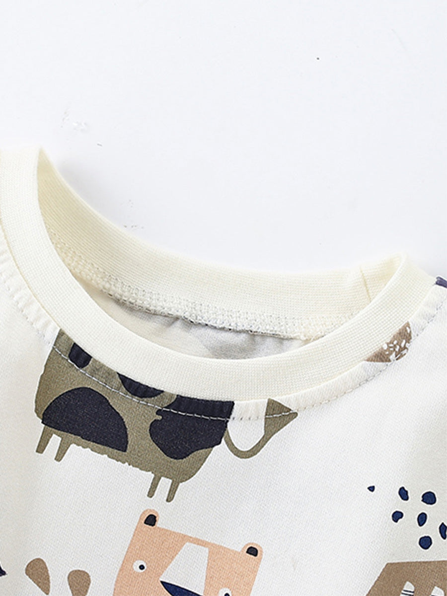 Summer Baby Kids Unisex Short Sleeves shirt featuring an abstract animals cartoon pattern in beige color, perfect for warm weather.