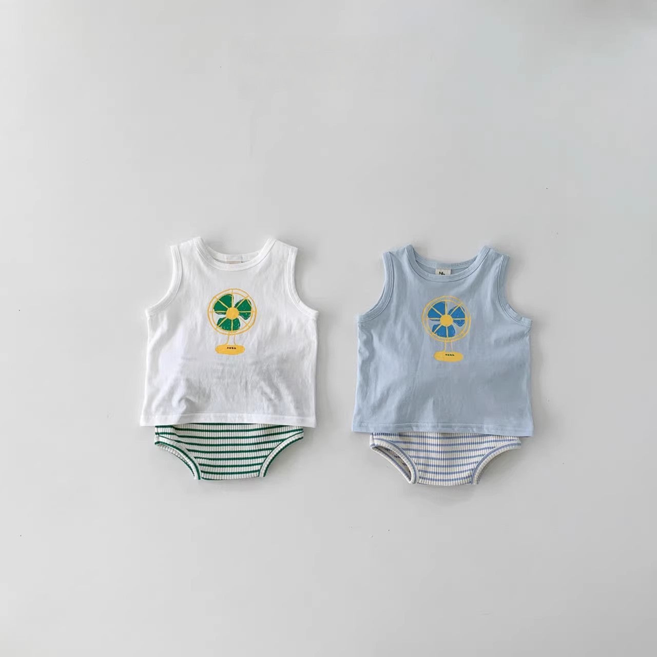 Summer Baby Kids Unisex Cartoon Pattern Top Vest and Striped Bloomers in white and blue, featuring playful cartoon designs.