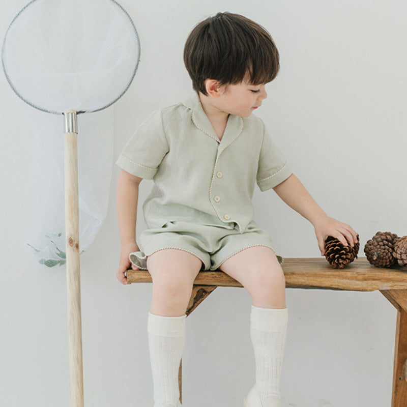 Summer Baby Kids Unisex Simple V Neck Top Shirt in green and beige colors, made from soft cotton, suitable for boys and girls.