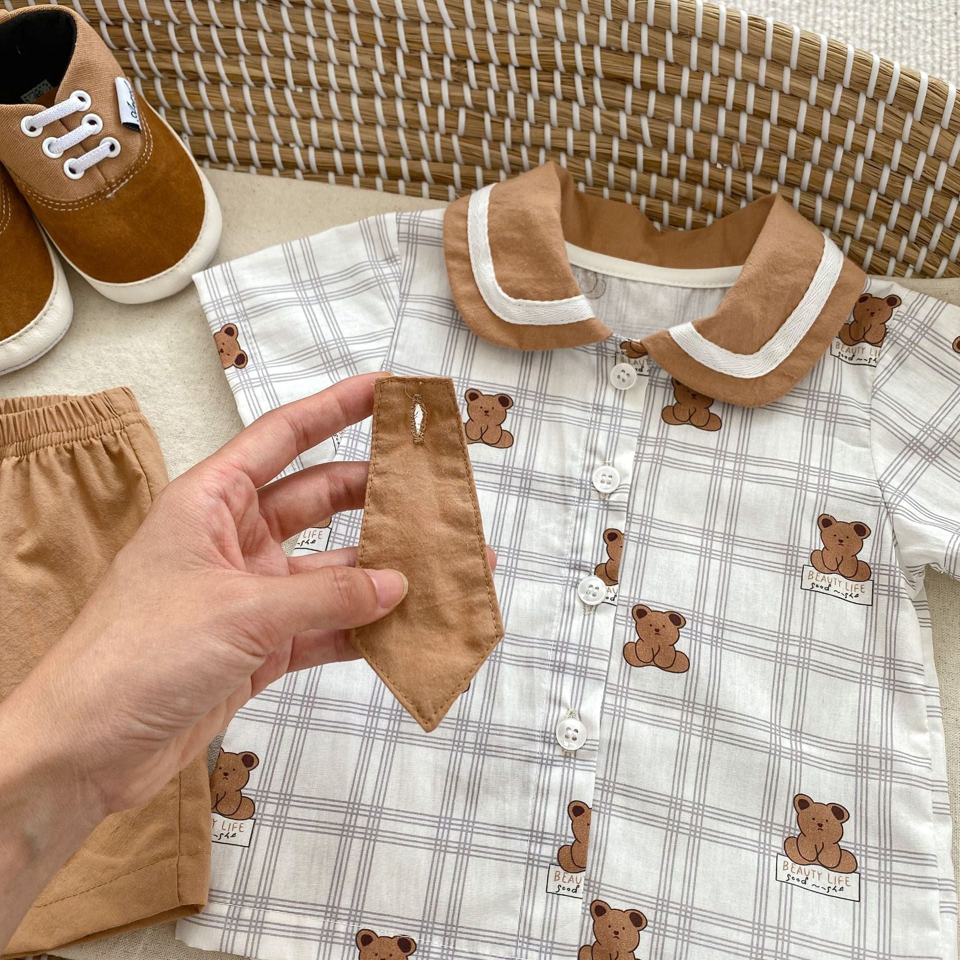 Summer Baby Teddy Pattern Plaid Short-Sleeved Romper in white and brown colors, featuring a cute teddy design, perfect for infants and toddlers.