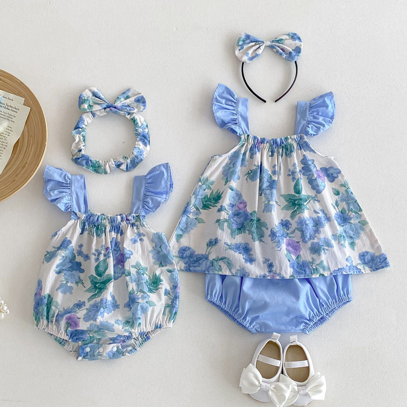 Summer girls sleeveless strap onesies with floral pattern in blue and light blue colors, made from soft cotton fabric.