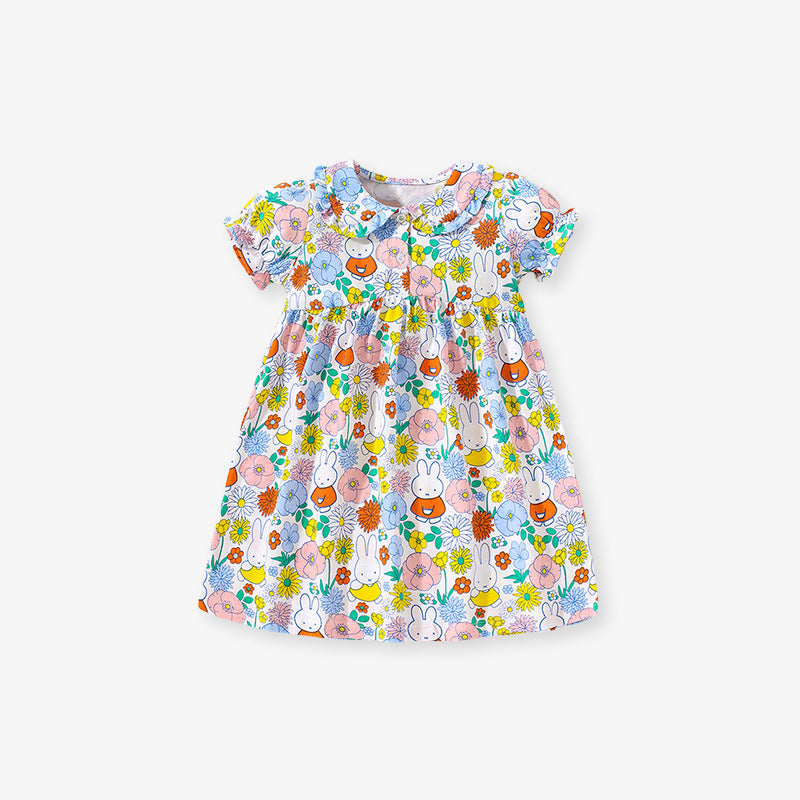 A vibrant yellow summer dress for girls featuring a floral print and a Peter Pan collar, perfect for warm weather outings.