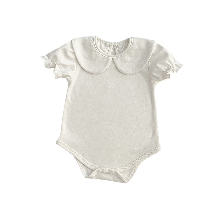 White baby onesie with collar.