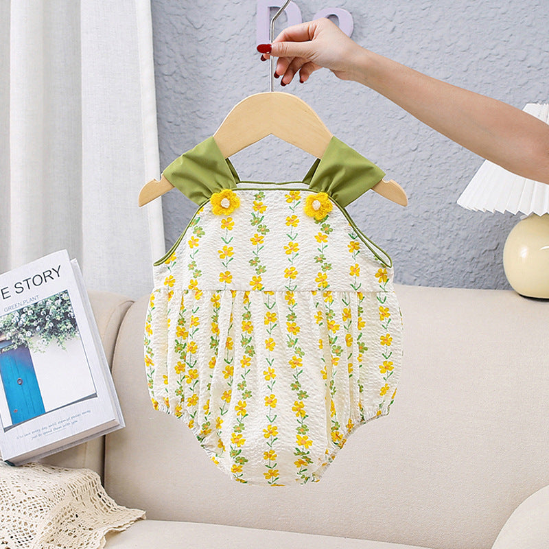 A bright yellow floral pattern sleeveless strap onesie for girls, showcasing vibrant flowers on a soft fabric.