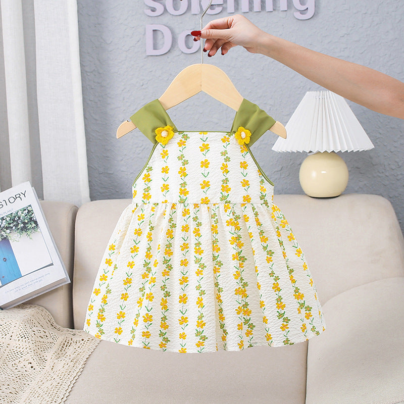 A bright yellow floral pattern sleeveless strap onesie for girls, showcasing vibrant flowers on a soft fabric.