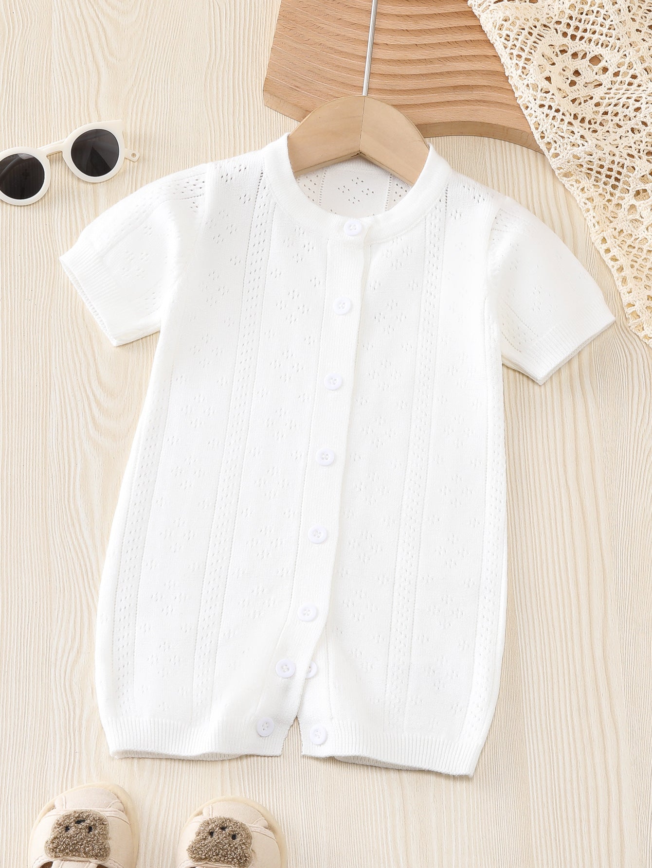 Summer New Arrival Baby Unisex Solid Color Short Sleeves in white, made from soft cotton and polyester blend, suitable for infants and toddlers.