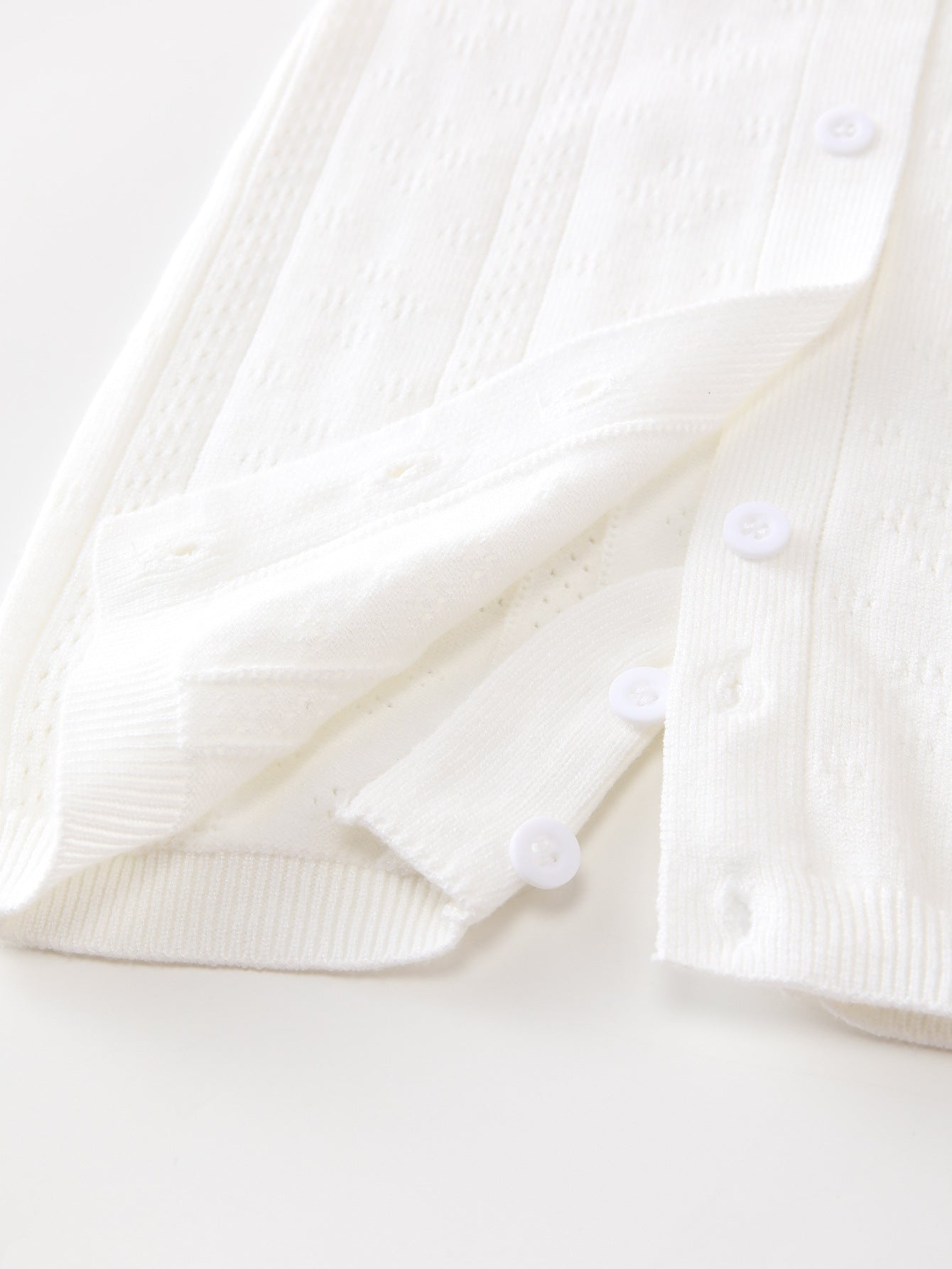 Summer New Arrival Baby Unisex Solid Color Short Sleeves in white, made from soft cotton and polyester blend, suitable for infants and toddlers.