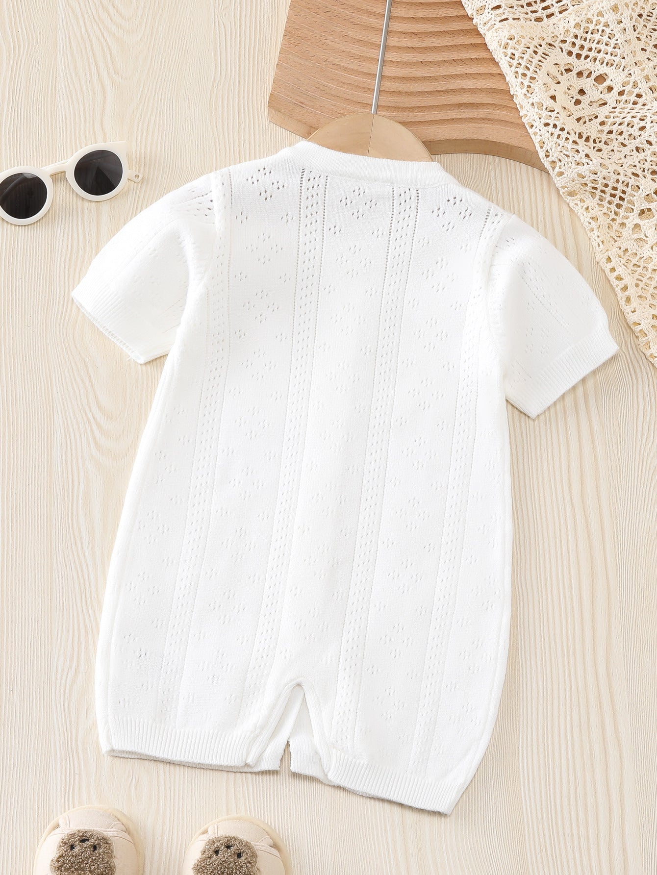 Summer New Arrival Baby Unisex Solid Color Short Sleeves in white, made from soft cotton and polyester blend, suitable for infants and toddlers.