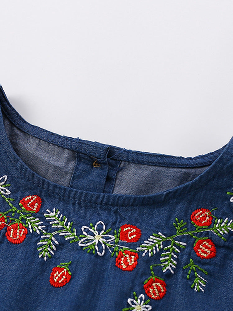 Girls' navy blue short sleeve top with floral embroidery, perfect for summer wear.