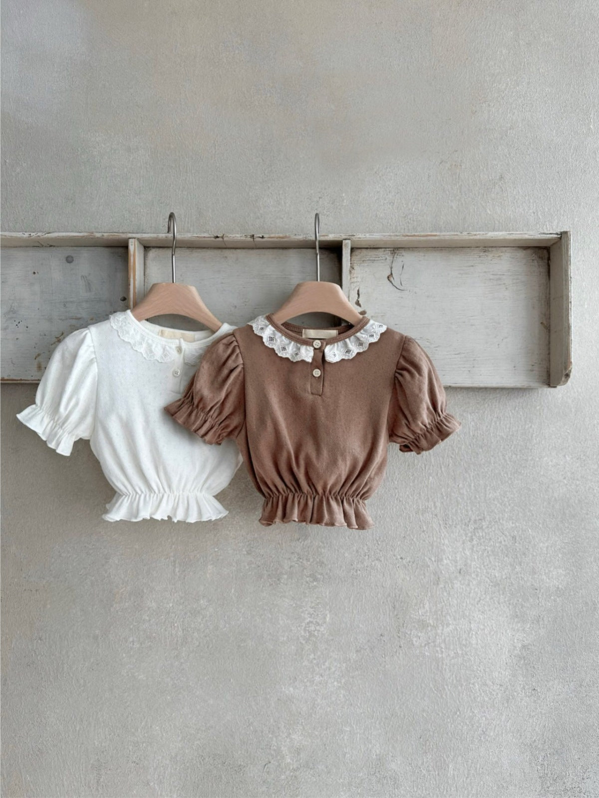 Summer New Design Baby Girl dress featuring geometric pattern collar and short puff sleeves in white and coffee colors.