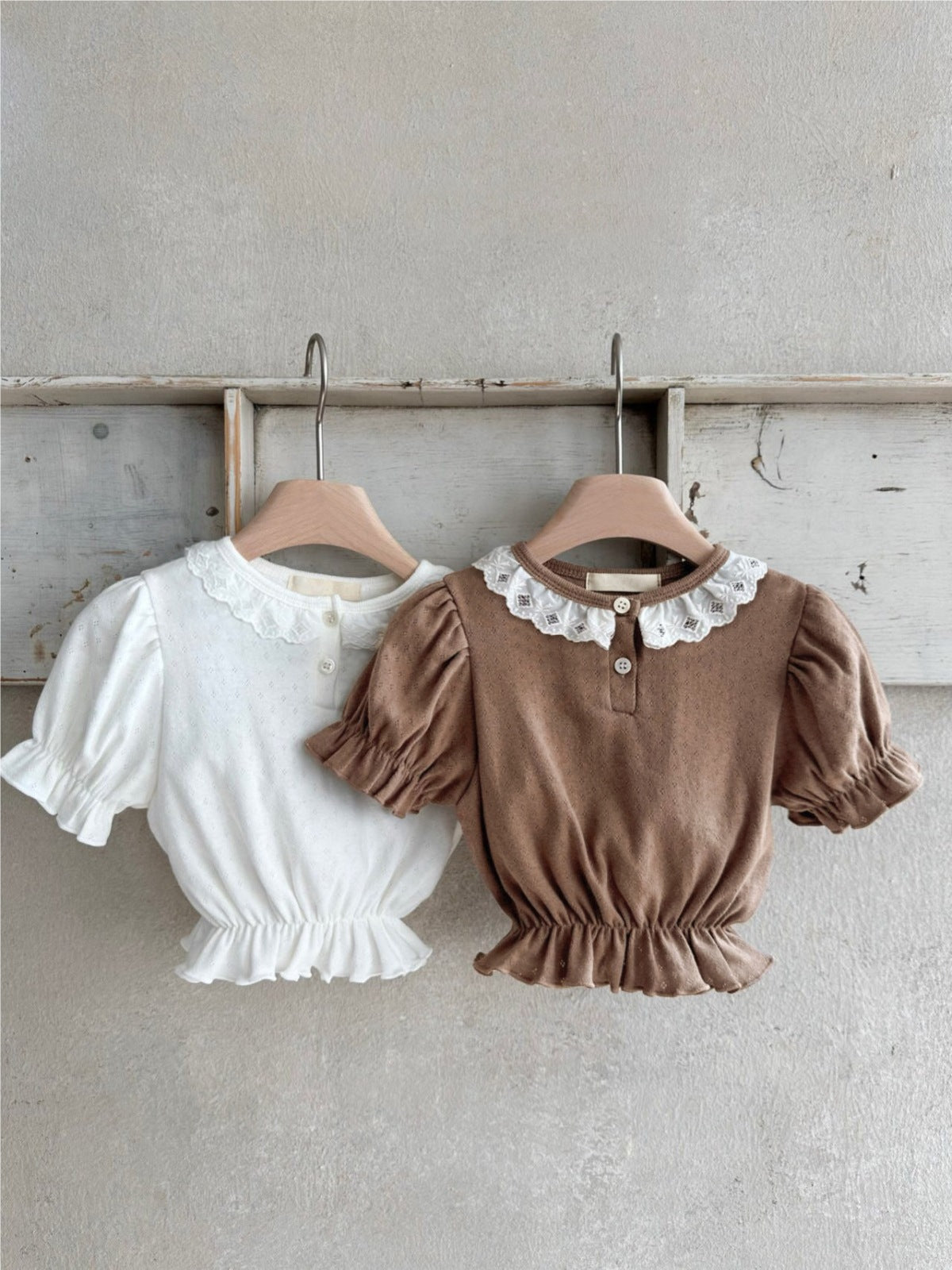 Summer New Design Baby Girl dress featuring geometric pattern collar and short puff sleeves in white and coffee colors.