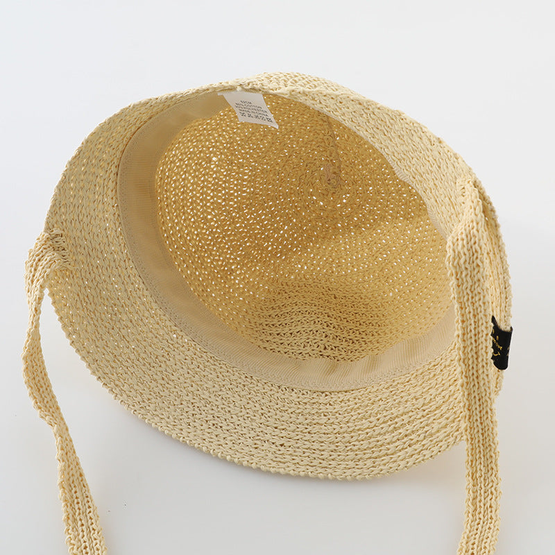 A stylish summer straw hat for girls in khaki and beige, perfect for sun protection and fashionable outings.