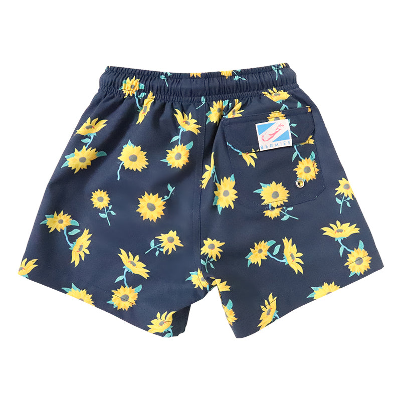 Bright and colorful Sunflower Kids swim trunks made from recycled materials, featuring a stretchy mesh liner and multiple pockets.