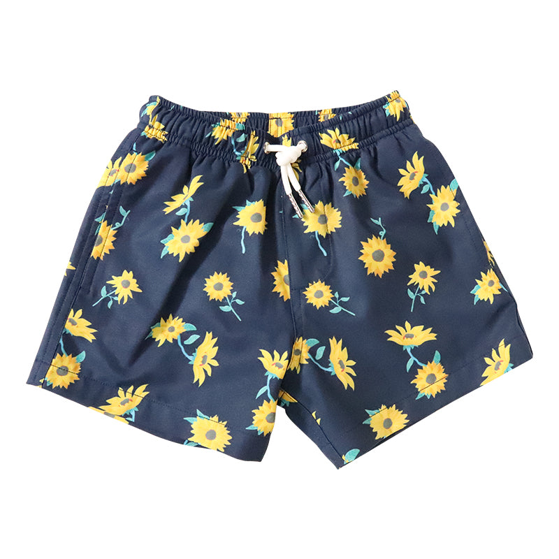 Bright and colorful Sunflower Kids swim trunks made from recycled materials, featuring a stretchy mesh liner and multiple pockets.