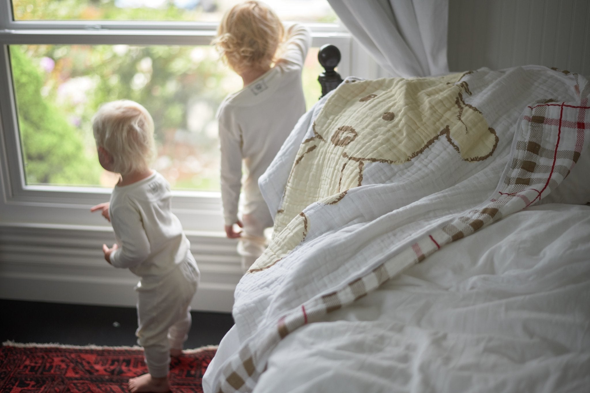Teddy Bear and Plaid Cotton Muslin Newcastle Blanket featuring a soft, cozy design with a playful teddy bear pattern.