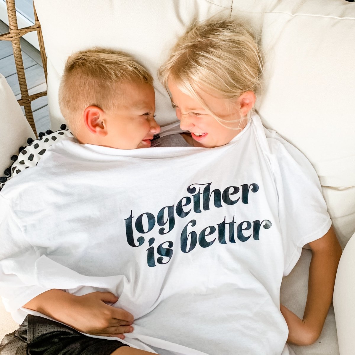 A colorful Together is Better Shirt designed for kids, showcasing its soft fabric and durable stitching.