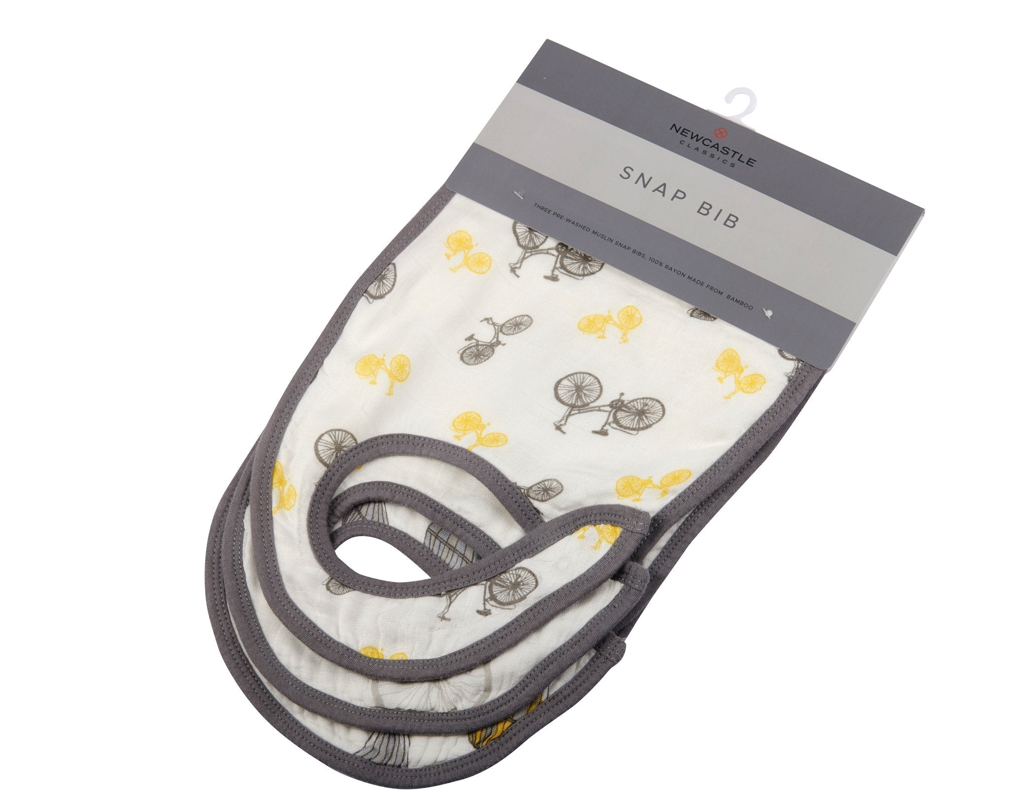 A pack of three stylish Traveler Bamboo Muslin Snap Bibs featuring adjustable snaps and soft, absorbent fabric, perfect for feeding and teething.