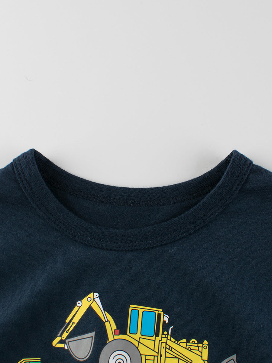 Boys' summer t-shirt featuring a colorful truck print, available in white and navy blue, made from soft cotton material.