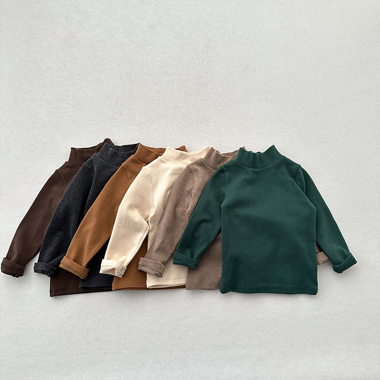 Unisex Baby Kids Stretch Solid Long Sleeve Sweatshirt in various colors, showcasing its soft fabric and versatile design.