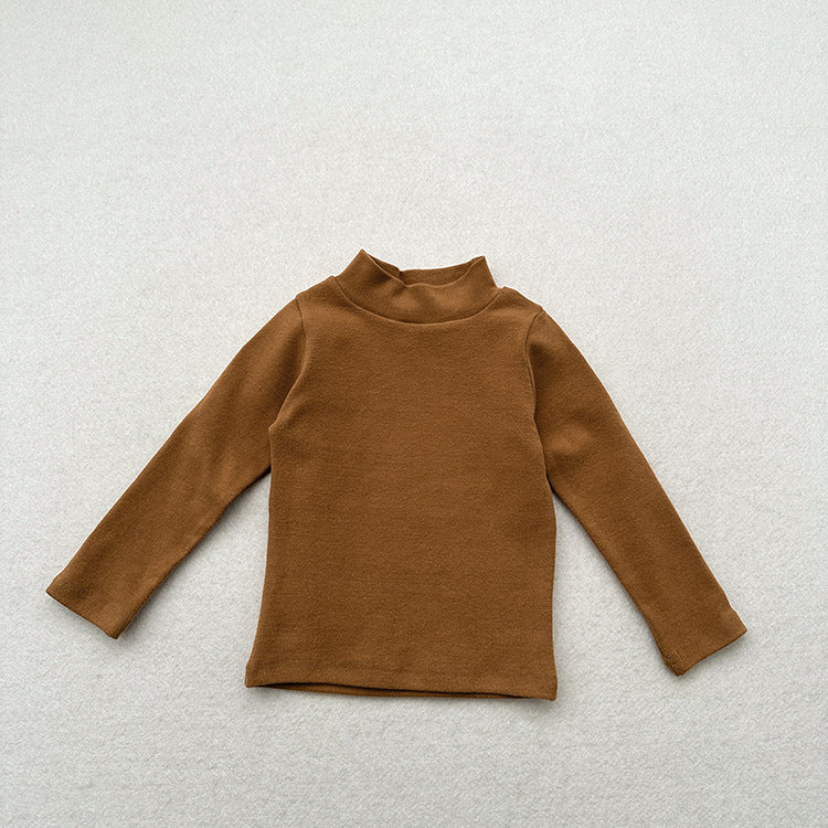 Unisex Baby Kids Stretch Solid Long Sleeve Sweatshirt in various colors, showcasing its soft fabric and versatile design.