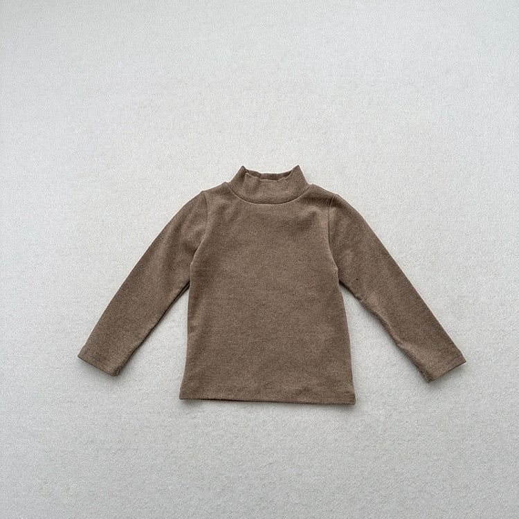 Unisex Baby Kids Stretch Solid Long Sleeve Sweatshirt in various colors, showcasing its soft fabric and versatile design.