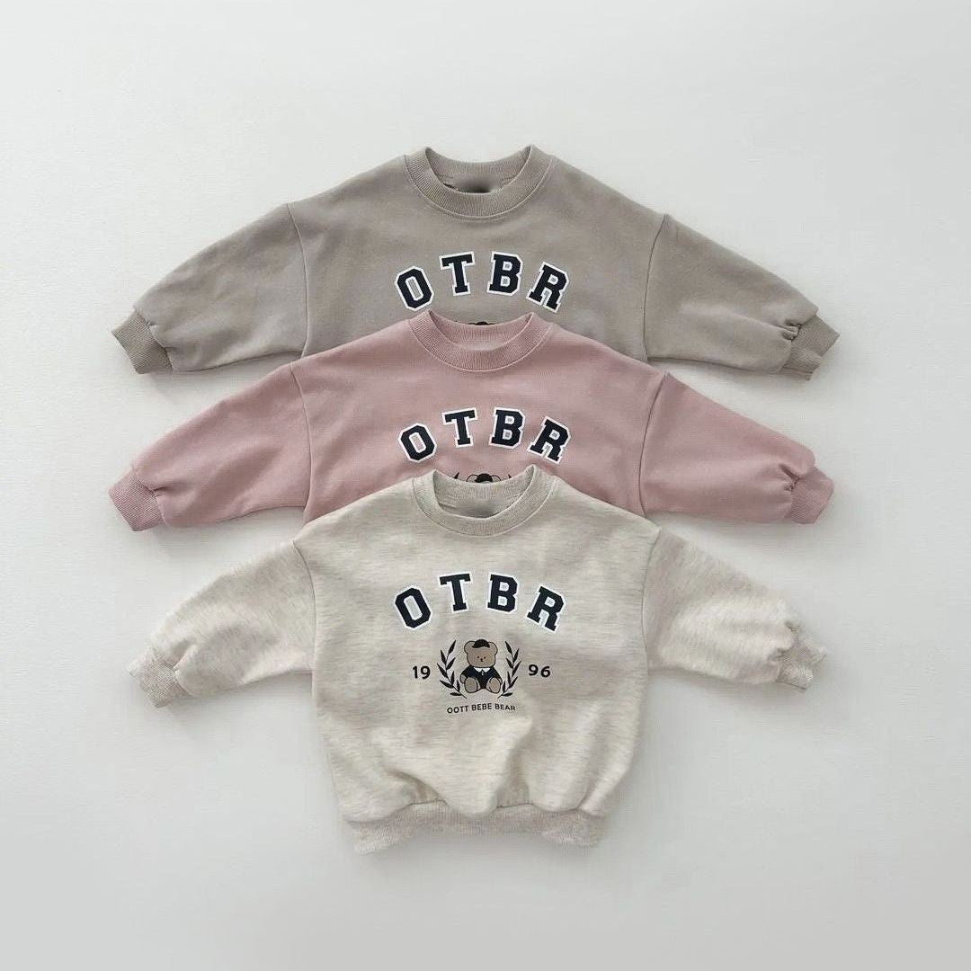 Unisex Baby Letter Print Combo featuring a cartoon pattern top and long pants in pink, grey, and apricot colors, perfect for baby girls.