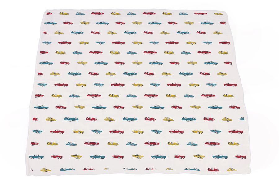 A cozy Vintage Muscle Cars and Motorcycles Bamboo Muslin Blanket, featuring vibrant designs of classic cars and motorcycles, perfect for kids.