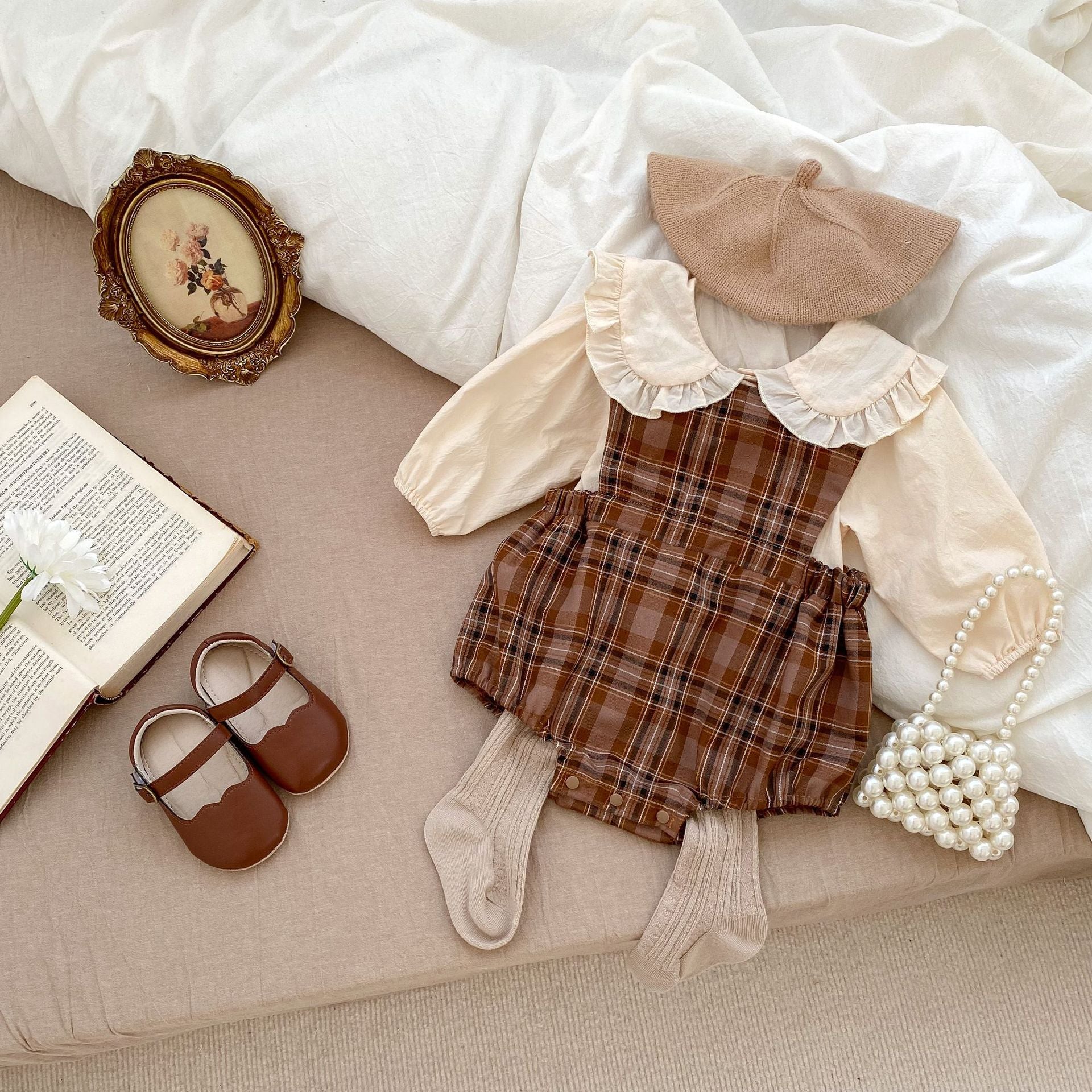Vintage style plaid pattern strap onesie for baby girl, featuring a brown color and soft cotton material, perfect for spring and autumn.