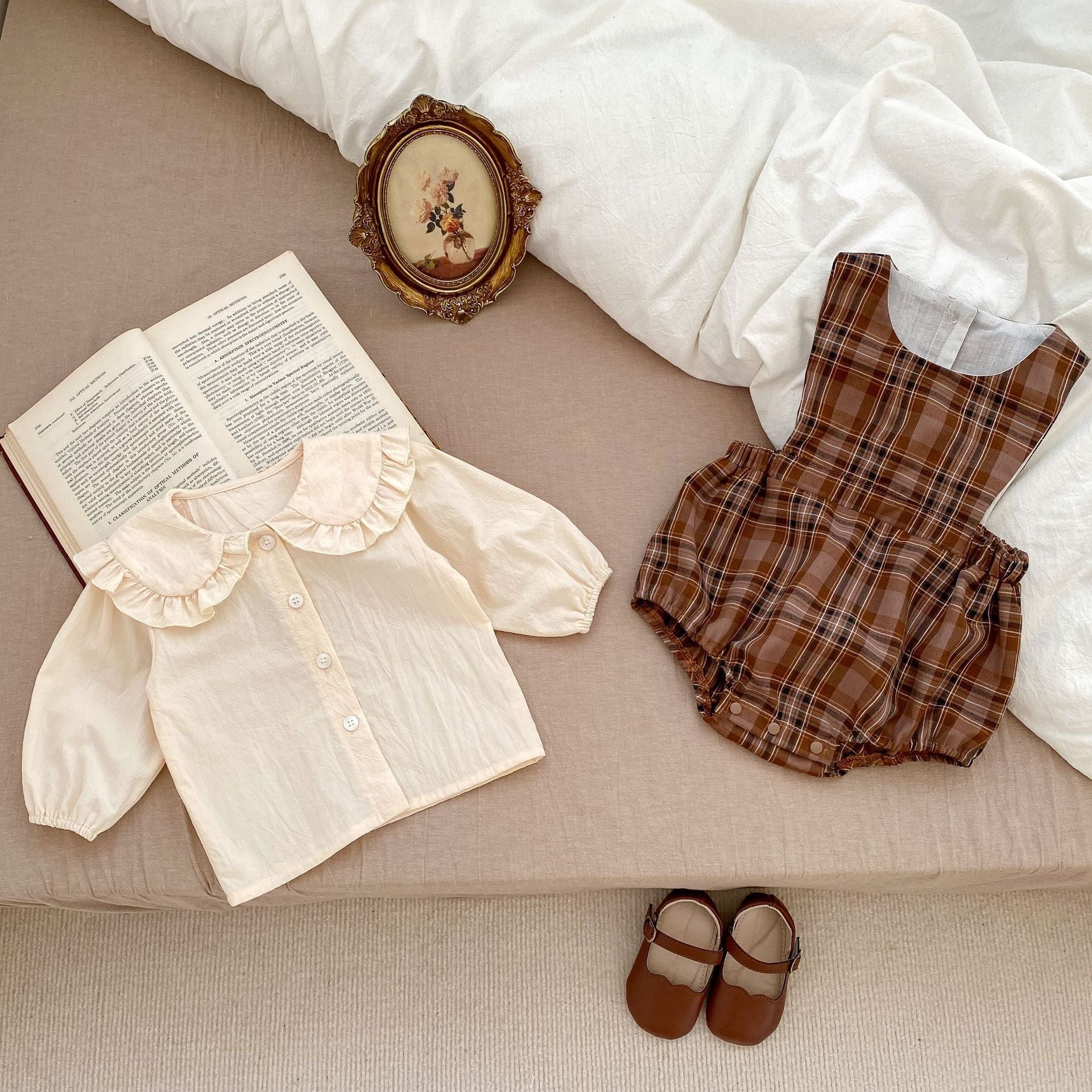 Vintage style plaid pattern strap onesie for baby girl, featuring a brown color and soft cotton material, perfect for spring and autumn.