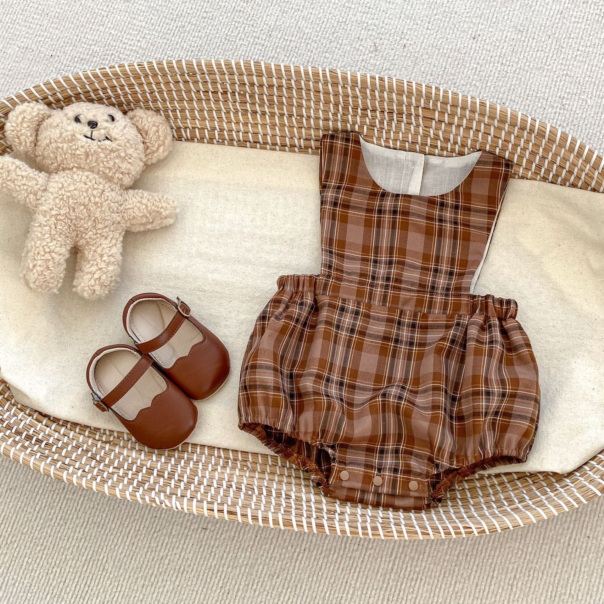 Vintage style plaid pattern strap onesie for baby girl, featuring a brown color and soft cotton material, perfect for spring and autumn.