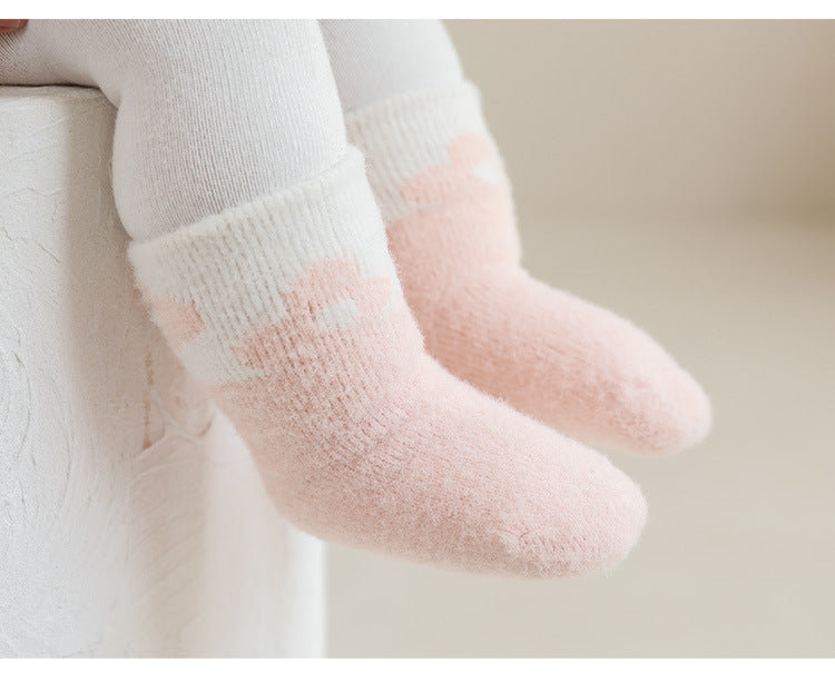 Winter Baby Unisex Breathable Comfy Cartoon Antiskid Socks in various colors with cartoon patterns, designed for comfort and safety.