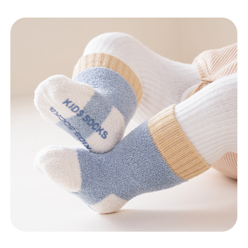 Winter Baby Unisex Breathable Comfy Patchwork Antiskid Socks in various colors, showcasing their soft texture and antiskid soles.