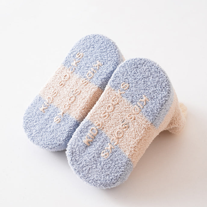 Winter Baby Unisex Breathable Comfy Patchwork Antiskid Socks in various colors, showcasing their soft texture and antiskid soles.