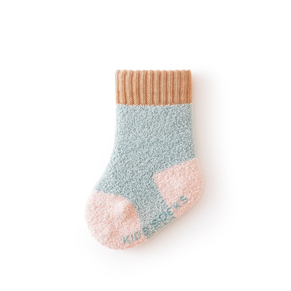 Winter Baby Unisex Breathable Comfy Patchwork Antiskid Socks in various colors, showcasing their soft texture and antiskid soles.