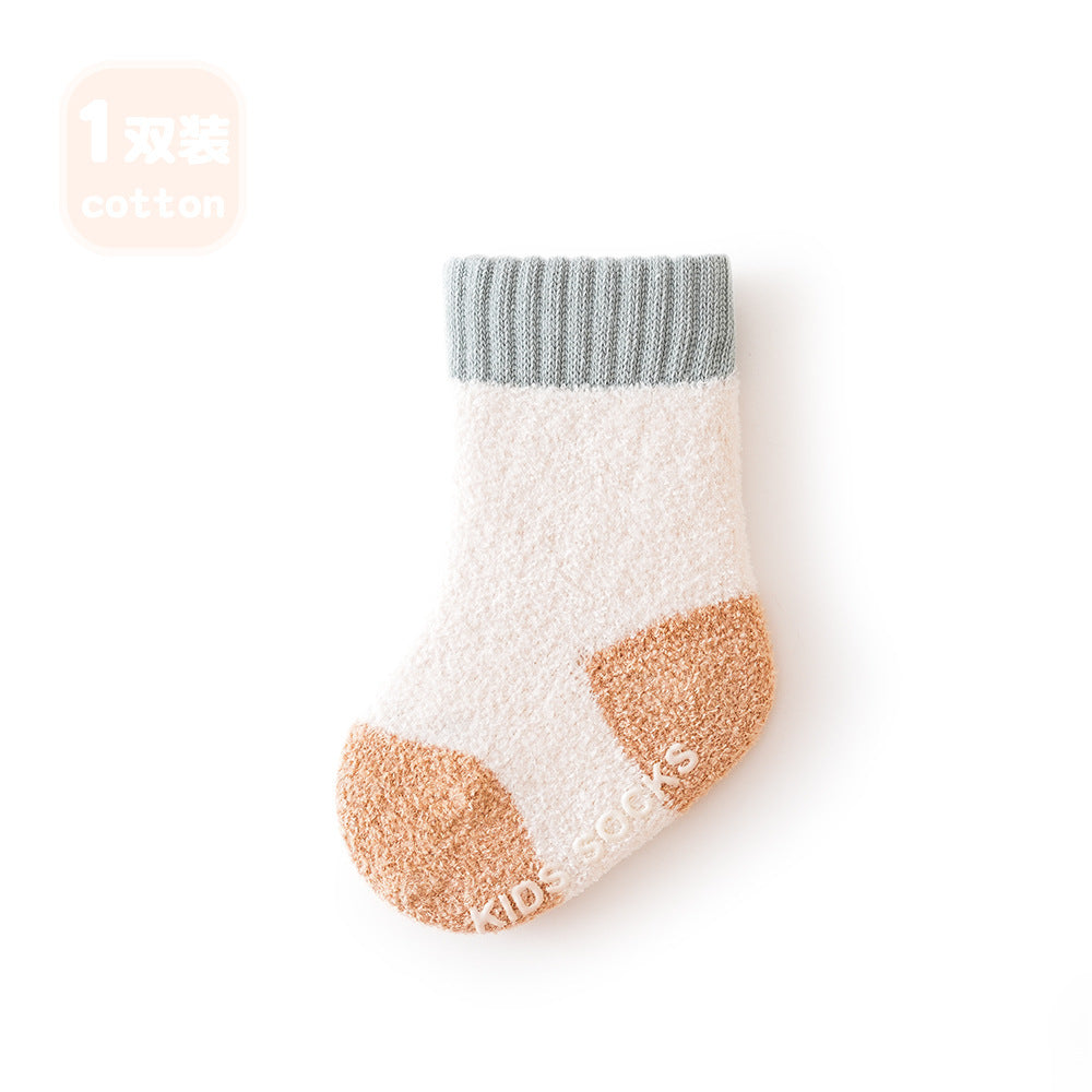 Winter Baby Unisex Breathable Comfy Patchwork Antiskid Socks in various colors, showcasing their soft texture and antiskid soles.