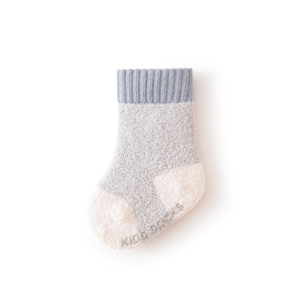 Winter Baby Unisex Breathable Comfy Patchwork Antiskid Socks in various colors, showcasing their soft texture and antiskid soles.