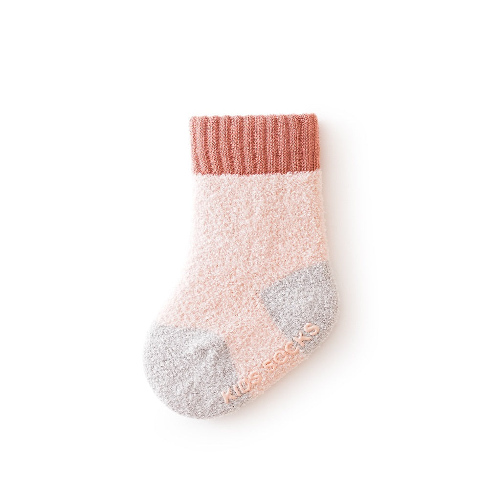 Winter Baby Unisex Breathable Comfy Patchwork Antiskid Socks in various colors, showcasing their soft texture and antiskid soles.