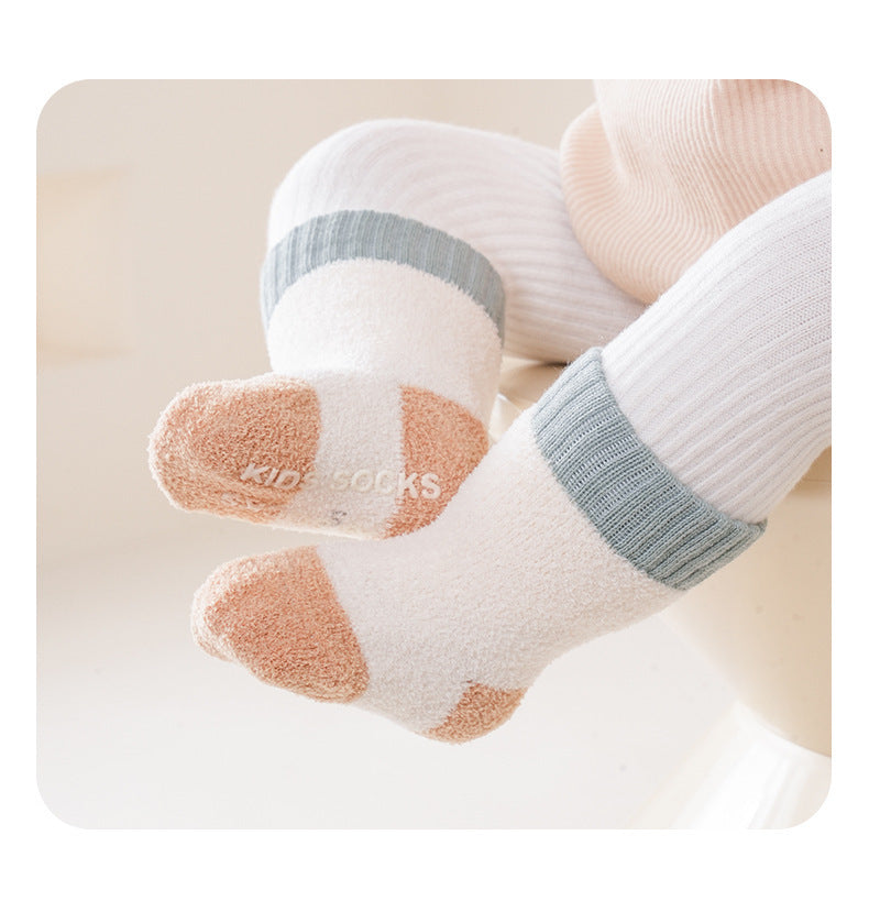 Winter Baby Unisex Breathable Comfy Patchwork Antiskid Socks in various colors, showcasing their soft texture and antiskid soles.