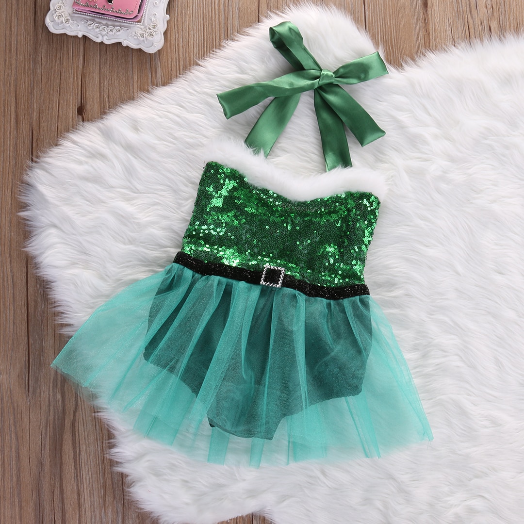 Green sequined dress with bow.