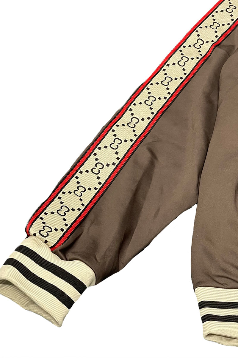 Men's CC Logo Track Jacket and Pant Set featuring a full zip-up jacket and elastic waist pants with striped logo detailing.