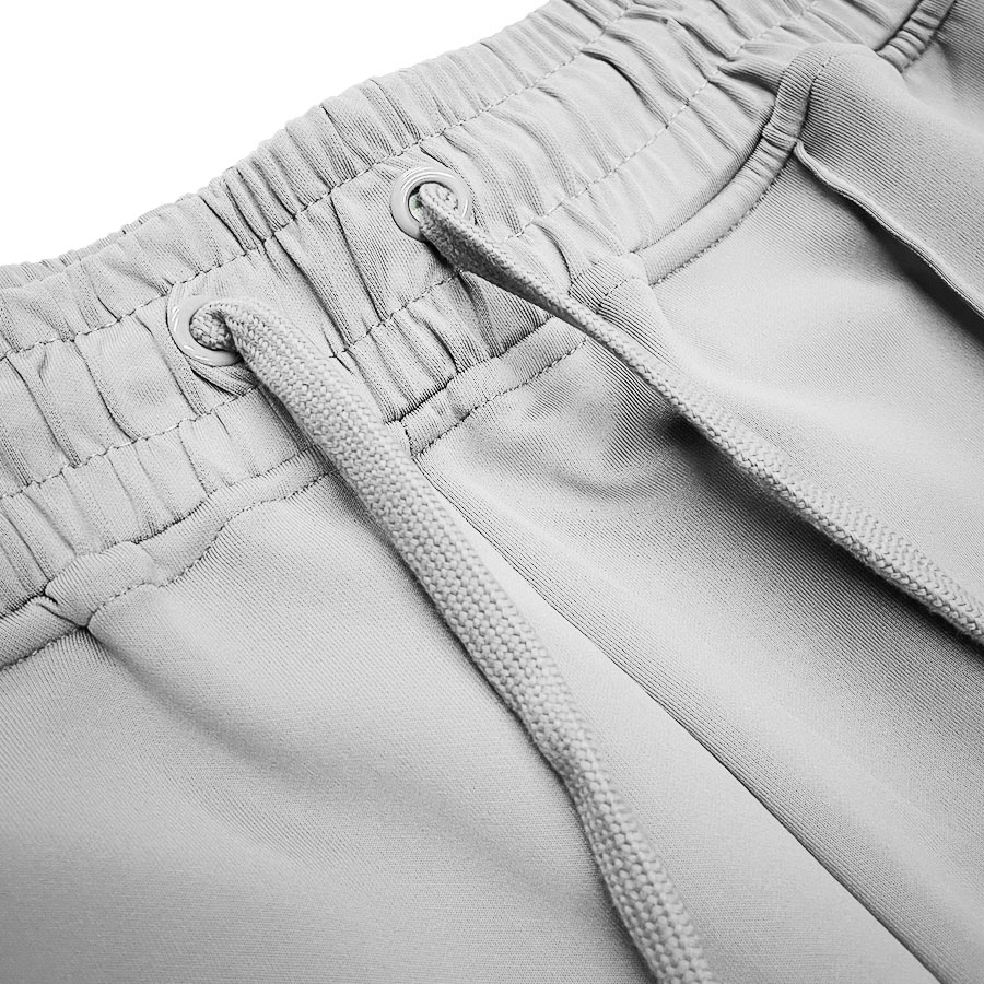 Men's Flare Stacked Track Suit featuring a matching jacket and pants with white side piping and zippered pockets.