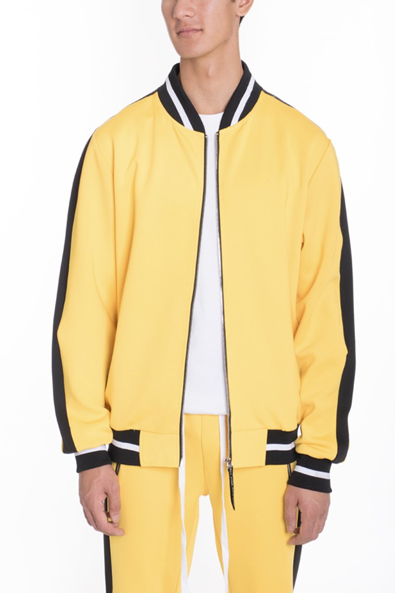 Heavy Weight Solid Track Jacket featuring ribbed waist, cuffs, and collar with contrast colored stripe sides, designed for comfort and style.