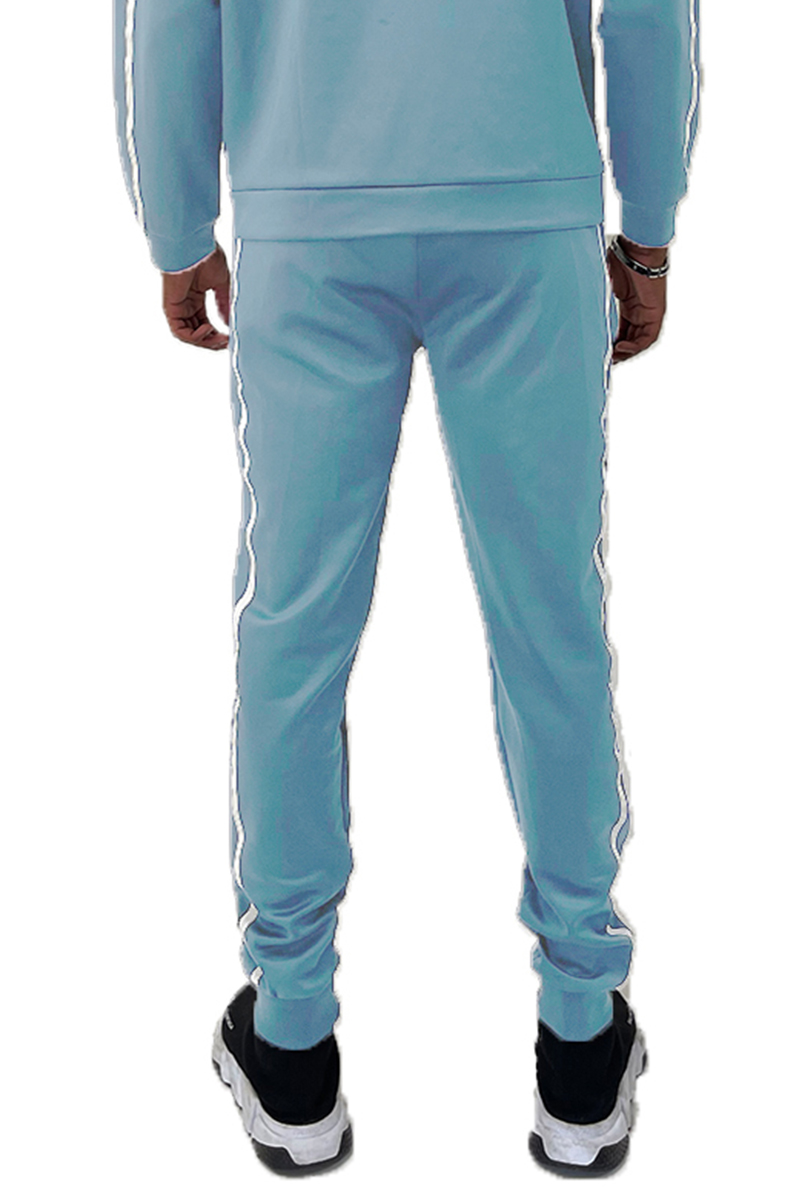 Jordan Tape Track Jacket and Jogger Set featuring a full zip jacket and elastic waist joggers in a stylish design.