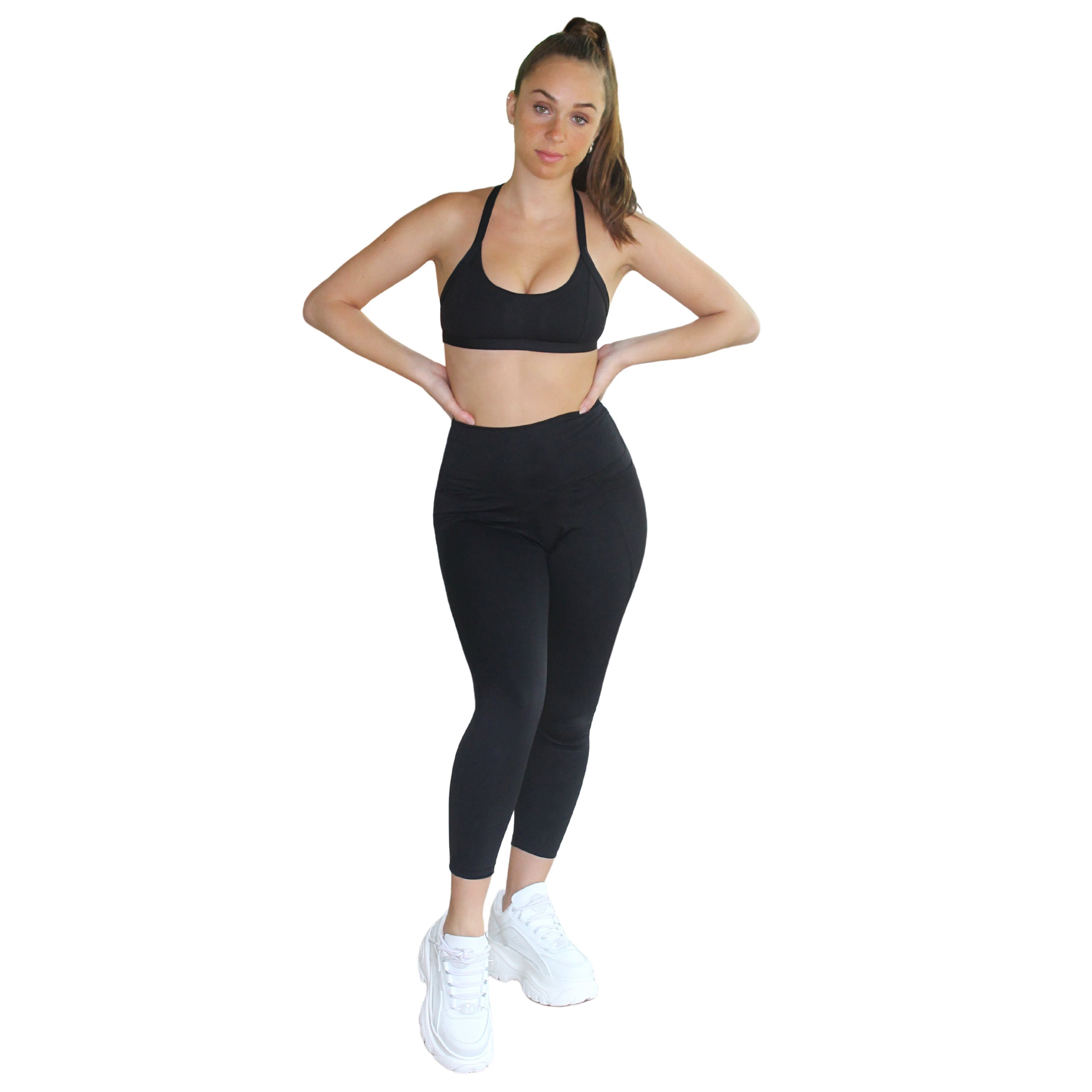 Om High Rise 7/8 Yoga Leggings in Black with side pockets and a high-rise waistband, designed for comfort and style.