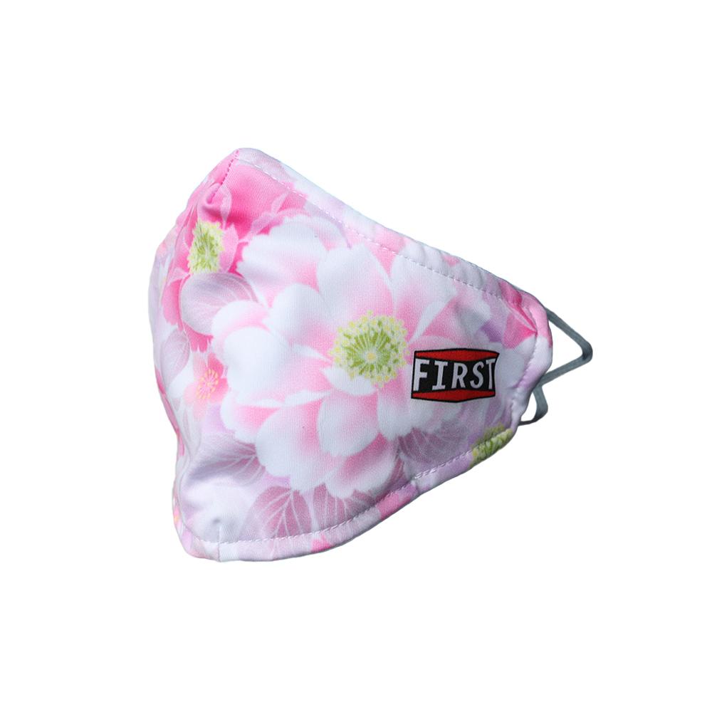 A set of 5 reusable 2-ply white and pink floral masks with elastic ear bands, showcasing a stylish design for everyday use.